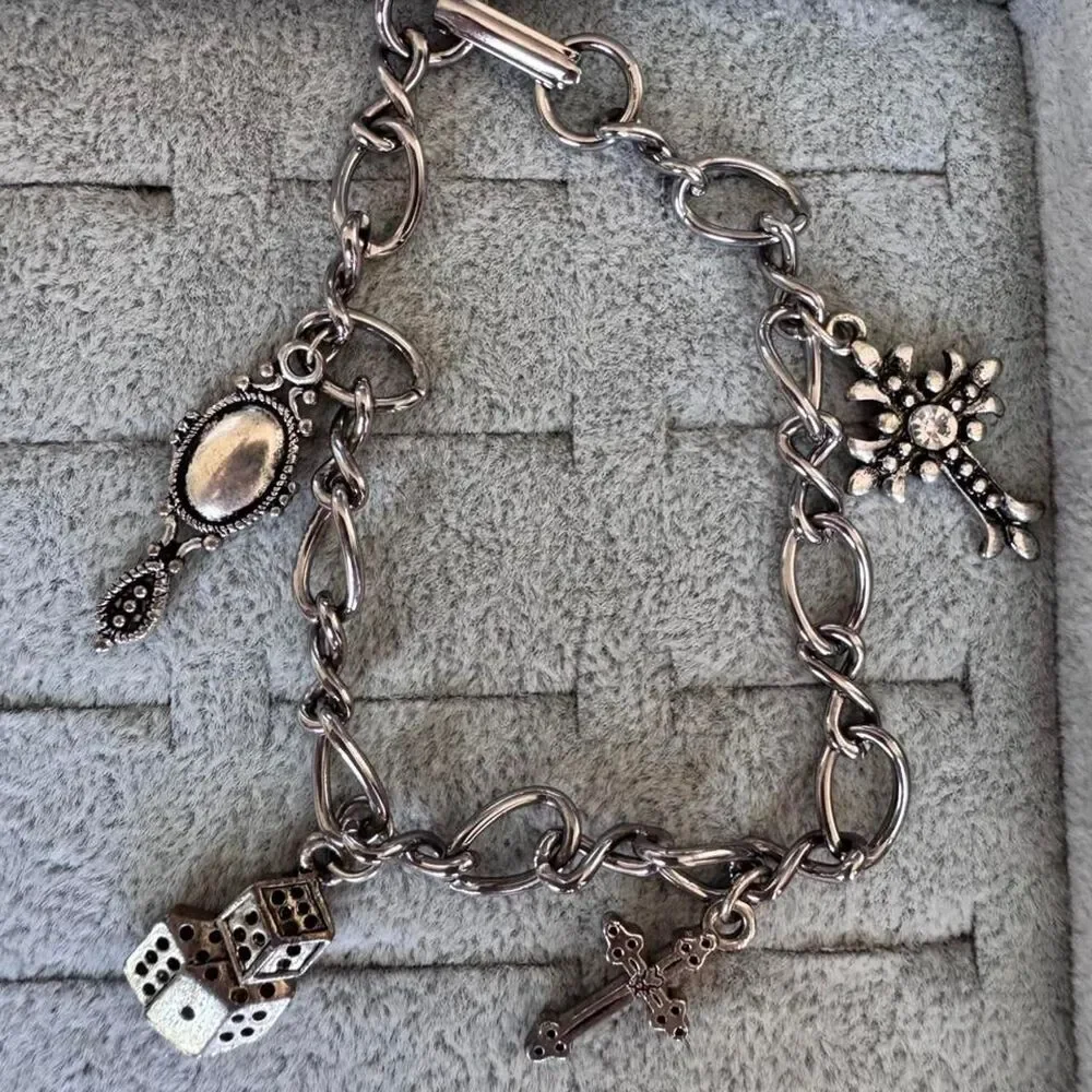 Source Unknown silver tone